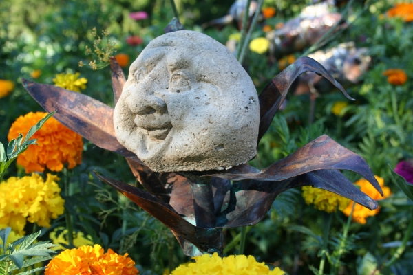 Click here to view Garden Laughter Head with Copper Leaves by Natalie Brown