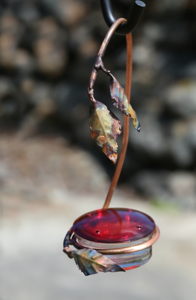 Click here to view Hanging Hummingbird Feeder by Natalie Brown